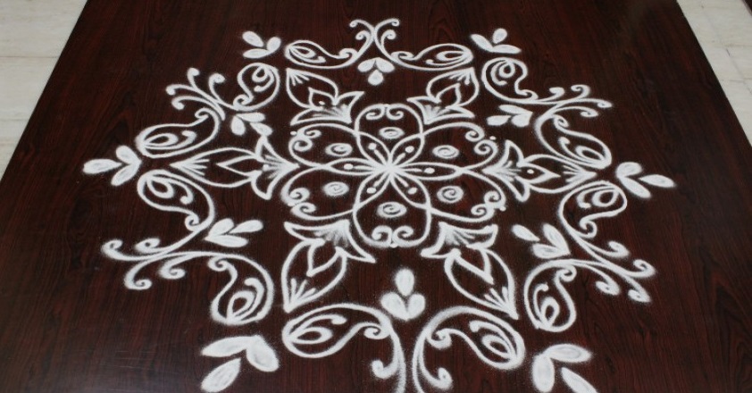 Rangoli designs with flowers and having traditional themes